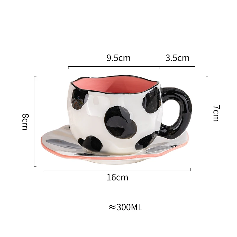 tasse à pois noir et blanc